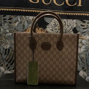 Tan and  Brown Monogram Tote Bag. Beautiful bag. Clost clearout no returns.